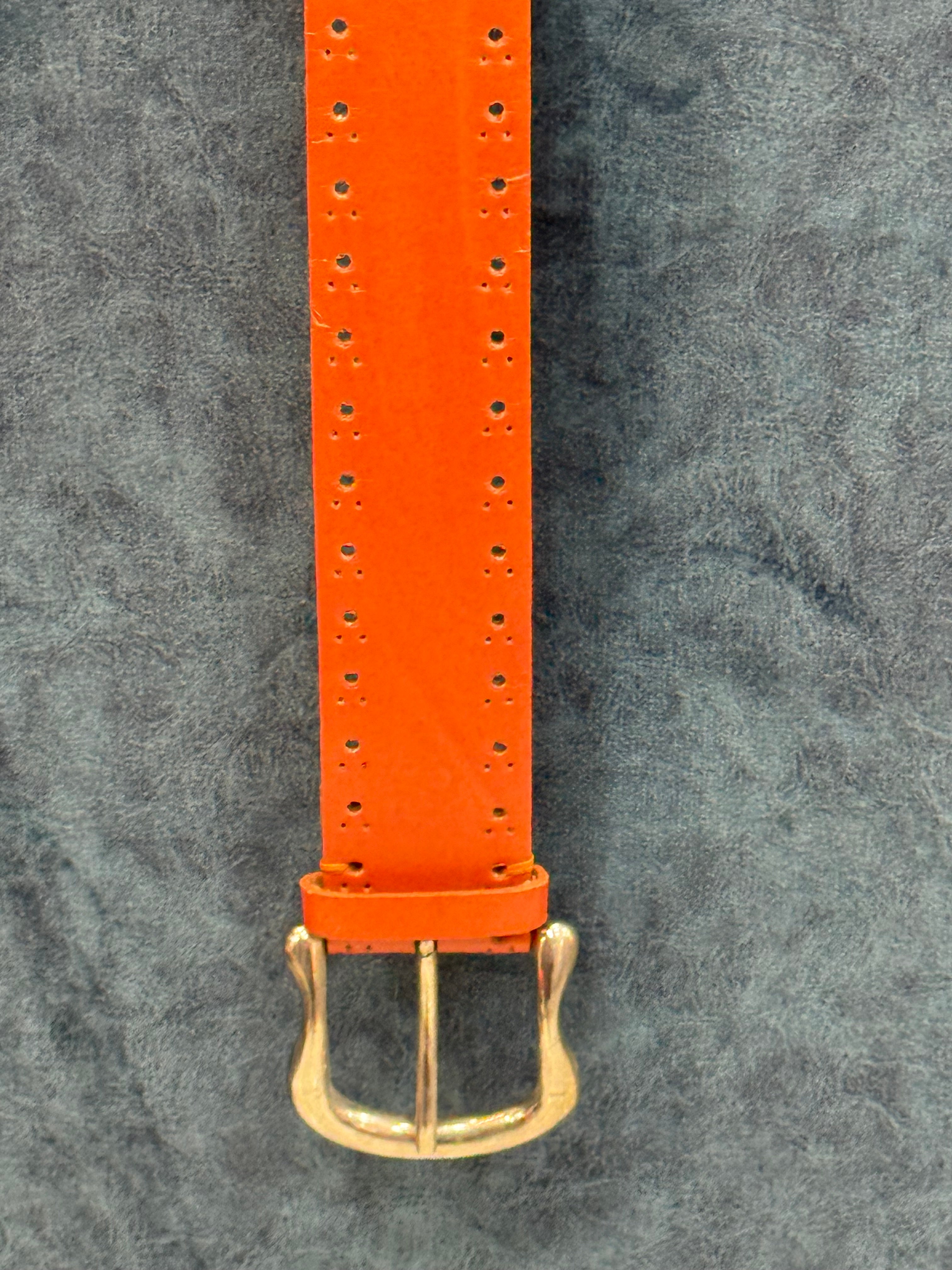 Orange Leather Belt with Multiple Holes – Bold Statement