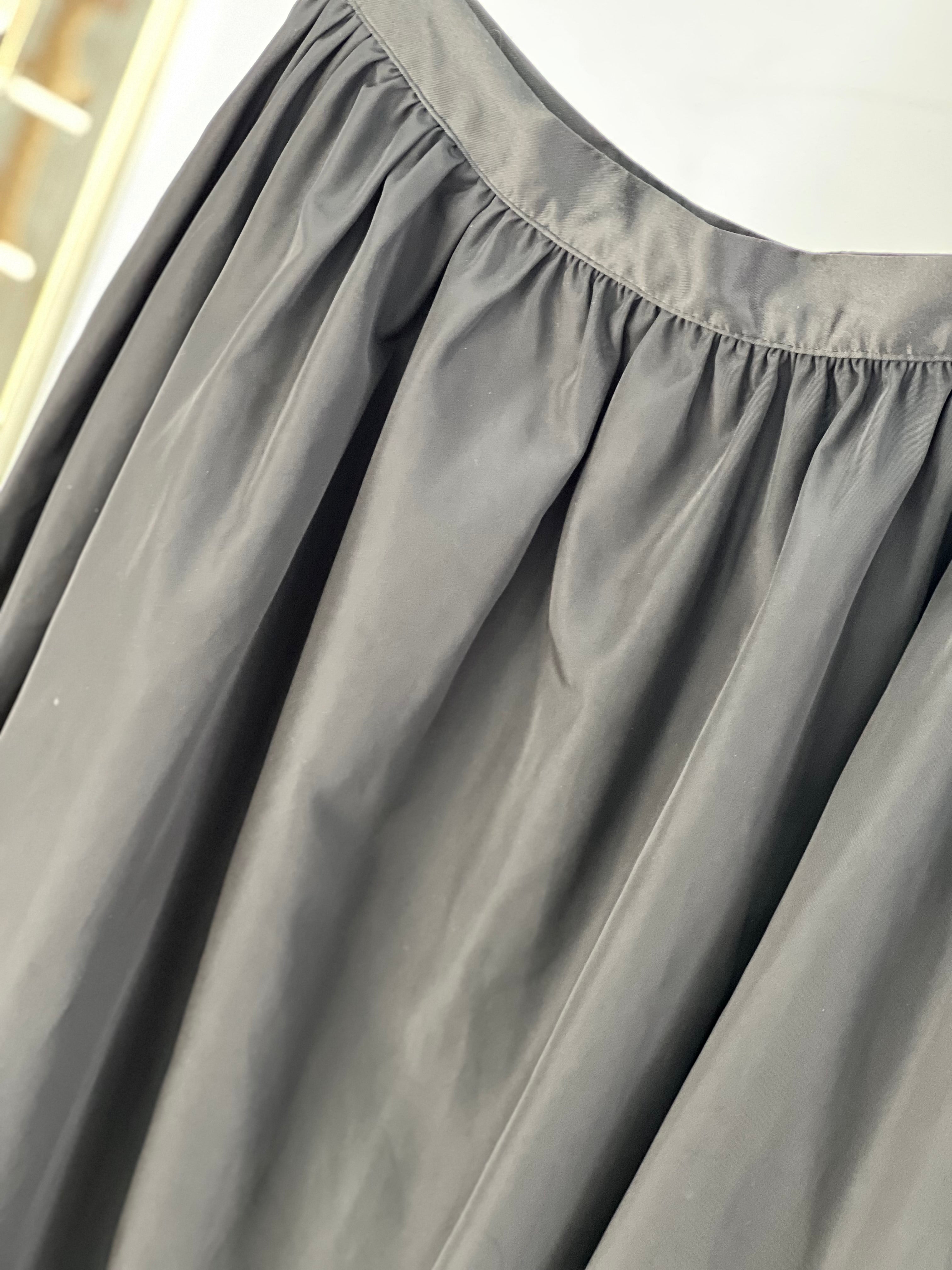 The Black Satin Midi – Classic Meets Curve