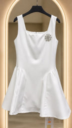 Curved short dress with stones broche