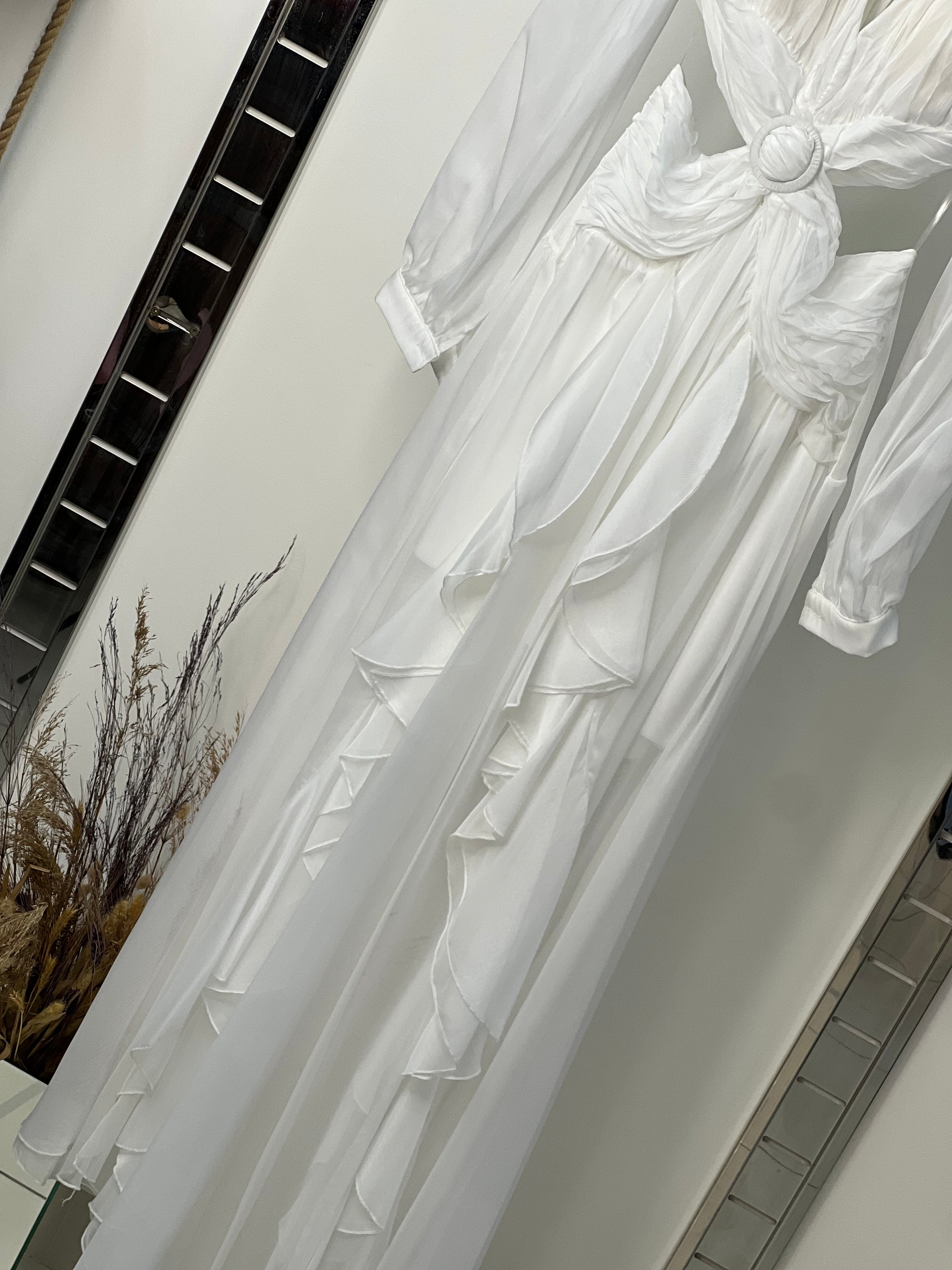 Runway Muse: Draped WhiteCutout Gown with Statement Ruffles